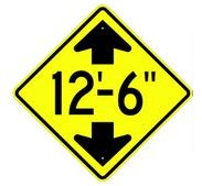 W12-2S Clearance With Arrows Sign